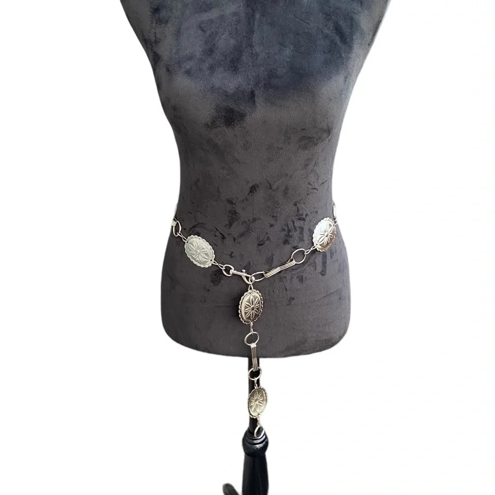 Silver‎ clip belt.  37” in length.